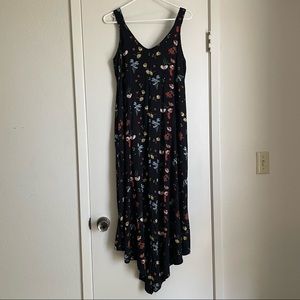 Black floral long dress with 2 pockets.